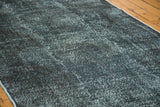 Vintage overdyed runner with a dark charcoal distressed texture.