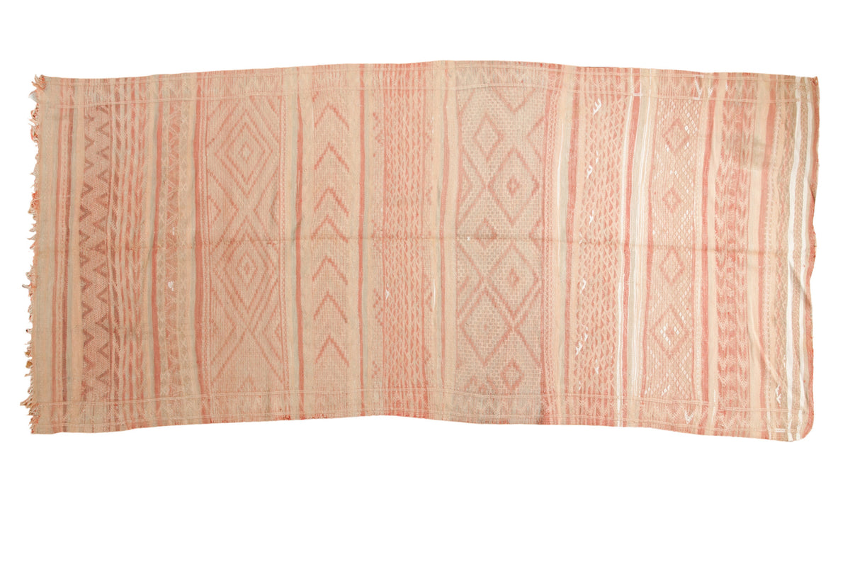 Vintage Moroccan embroidered Kilim runner featuring soft pink and beige tribal geometric patterns.