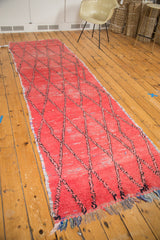 Distressed cinnabar red Moroccan runner, unique rag and cut pile weave, black diamond lattice.