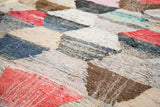 Vibrant hexagonal motif and textured recycled cotton weave of the vintage Moroccan rag rug.