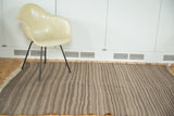 Vintage Moroccan Kilim rug featuring striated natural coffee, charcoal brown, and grey stripes.