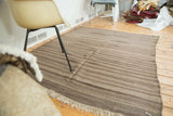 Vintage Moroccan Kilim flatweave rug featuring striated coffee brown tones and fringe.