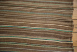 Vintage Moroccan Kilim with striated natural browns, ivory, green, and blue stripes, secured edge.