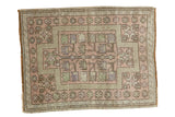 Hand-knotted Vintage Oushak rug mat, geometric flowers and starbursts, dusty blush, green, soft blue.