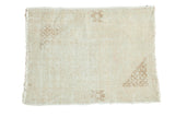 Blanched vintage Oushak distressed square rug with subtle ivory and light coffee spandrels.