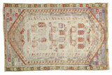 Vintage Distressed Oushak rug, faded cream field with unique colorful abstract motifs. 3'1