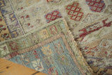 Muted, distressed Oushak rug pile texture and vibrant blue, green, red hand-knotted back.