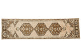 Vintage hand knotted Oushak runner, ornate triple medallion, soft bronze, charcoal, apricot, and sea foam.
