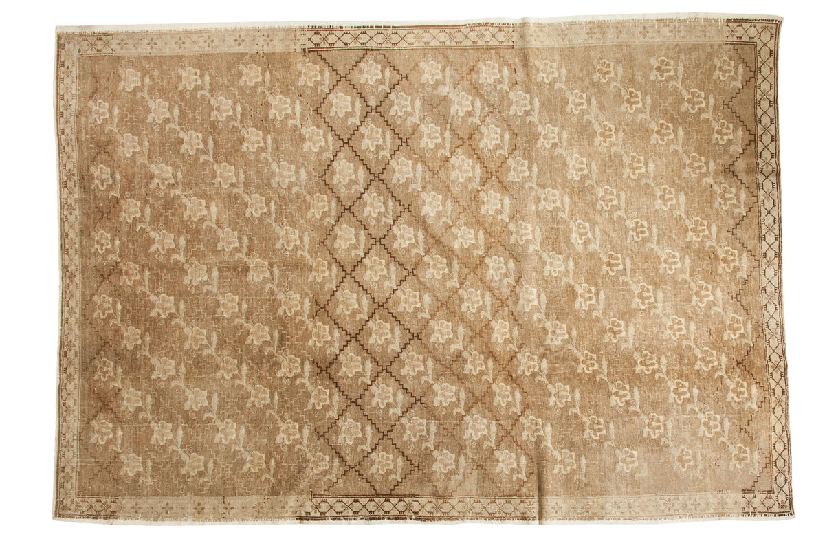 Vintage Oushak carpet, allover flower-lattice design in beige and ivory with abrashes, 7'5" x 10'8".