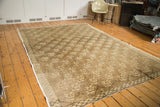 Vintage Oushak rug corner showing floral lattice pattern and tone-on-tone abrashes.