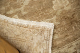 Hand-knotted foundation and tightly bound edge of the vintage Turkish Oushak carpet.