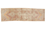 Distressed vintage Oushak runner, quadruple medallions in faded eggplant, tangerine, and ivory, 3x10.