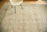 The textured, distressed pile of an ivory Sivas carpet with pops of cobalt blue.