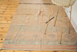 Lower border detail of vintage Turkish Jijim rug with pink, gray, and black embroidered geometric motifs.
