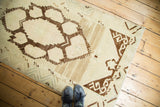 Hand-knotted Oushak runner detail with chocolate brown geometric pattern and subtle abrash.
