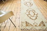 Hand knotted Oushak runner, geometric end design with chocolate brown and ivory abrash.