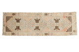 Vintage Oushak Distressed Rug Runner with triple chocolate medallions on a faded blush field.