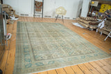 Vintage Turkish Kaisary rug showcasing its rich patina and muted copper-green Seychour pattern.