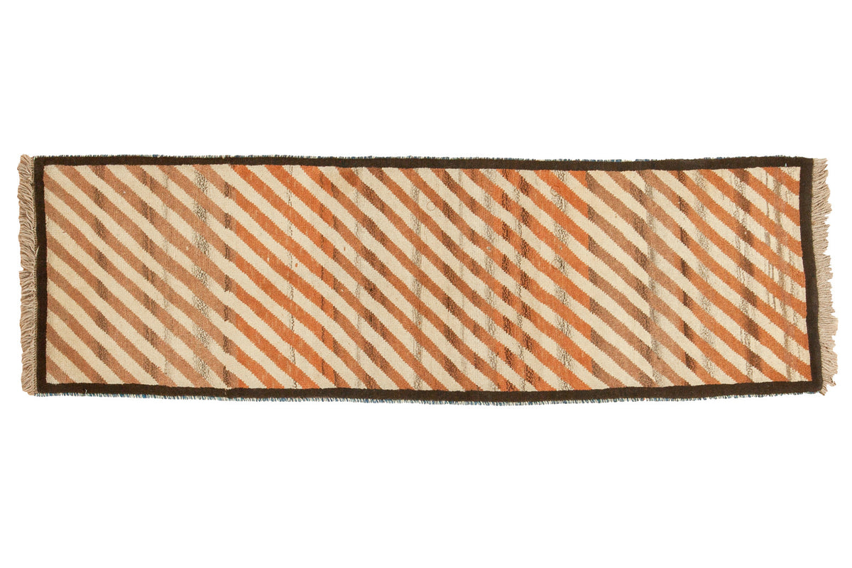 Vintage Gabbeh runner, diagonal ivory, copper, and brown stripes, dark charcoal border.