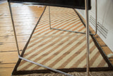 Qashqai Gabbeh runner corner, diagonal ivory, light copper stripes, dark border, fringe.