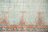 Distressed vintage Oushak rug border with geometric pattern in sky blue, peachy blush.