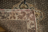 Vintage Oushak rug's folded corner, revealing its hand-knotted foundation and secure edge.