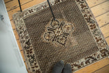 Diamond medallion and pearl patterned field of a vintage Oushak rug in brown tones.