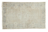 Distressed vintage Oushak rug, faded medallion in sand, beige, and slate blue tones, 2'10