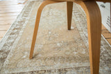 Faded copper blush, ivory, and beige distressed Oushak rug texture with visible foundation.