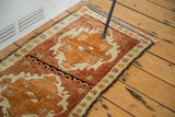 Plush, thick pile and original side cording of a vintage Oushak rug's corner.