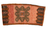 Vintage Oushak rug features crab medallion, plant motifs, brick red field, and tangerine accents.