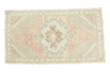 Vintage Oushak mat with blush, crab medallion, undulating sea foam, silver patterns. 1'8