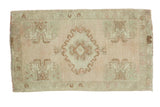 Vintage Oushak rug, oblong medallion, germinating flower motifs, ivory, blush, sea foam green.