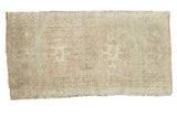Vintage hand knotted Oushak rug with faded ivory, peach, and sea foam green rectangular medallions, 1'8
