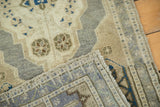 Hand-knotted construction detail of vintage Oushak rug, showing pile and secured side.