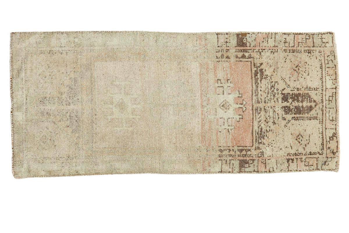 Vintage Oushak runner with faded ivory, sea foam, charcoal, and peach medallion.