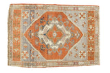 Hand-knotted Vintage Oushak runner with rust quatrefoil medallion, bird motif, slate blue field. 1'8