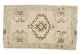 Hand knotted Vintage Oushak runner, ivory field, oblong medallion, green and brown.