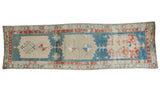 Antique Northwest Persian rug runner features triple beige medallions on a distressed aqua blue field, 3'2