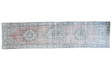 Vintage Oushak runner with triple medallions on pale blush, distressed aqua blue and ivory design.