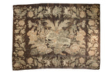 Vintage Bessarabian carpet with dark charcoal brown field and bold light floral design.