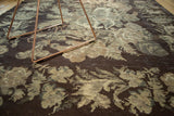 Textured pile of Vintage Bessarabian carpet with bold floral motifs in charcoal, ivory, and sage.