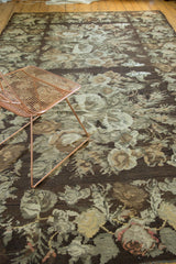 Vintage Turkish Kilim showcasing earthen green and brown European stylized floral motifs.