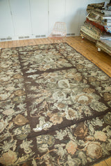 Vintage Turkish Kilim's European stylized rose and leaf design with earthen greens and brown.