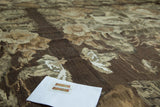 Hand woven Turkish Kilim with earthen green and brown European stylized pattern.