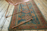 Vintage Oushak runner, hand-knotted, displaying aqua green linear floral field and rosy rust border.