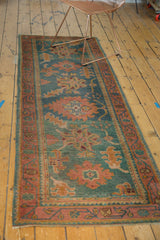 Vintage Oushak runner with denim blue, aqua green main field and rosy rust floral border.