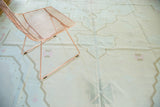 Geometric Serapi pattern with pale peach, light teal, and beige outlines.