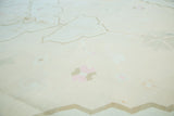 Dhurrie flatweave texture with minimalist peach, brown, and ivory geometric forms.