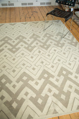 Abstract geometric pattern in ivory and grey on this hand-woven Egyptian Kilim carpet.